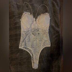Lace body suit..padded size Medium